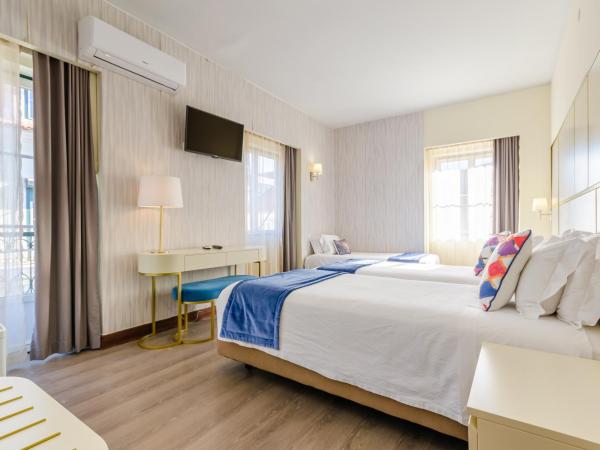 Hotel LX Rossio : photo 1 de la chambre chambre triple