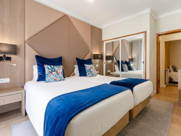 Hotel INN Rossio : photo 10 de la chambre chambre triple supérieure