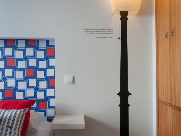 Pensao O Laranjeira : photo 3 de la chambre chambre double Économique avec balcon