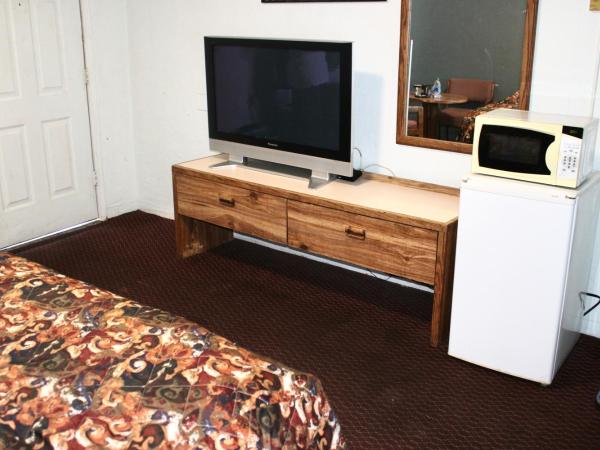 Economy Inn : photo 3 de la chambre chambre lit queen-size 