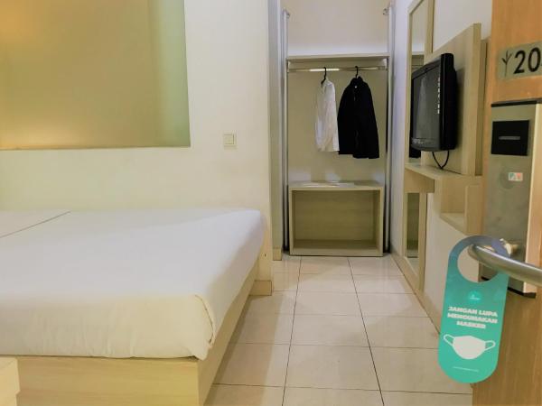 LeGreen Suite Penjernihan : photo 1 de la chambre chambre double ou lits jumeaux standard