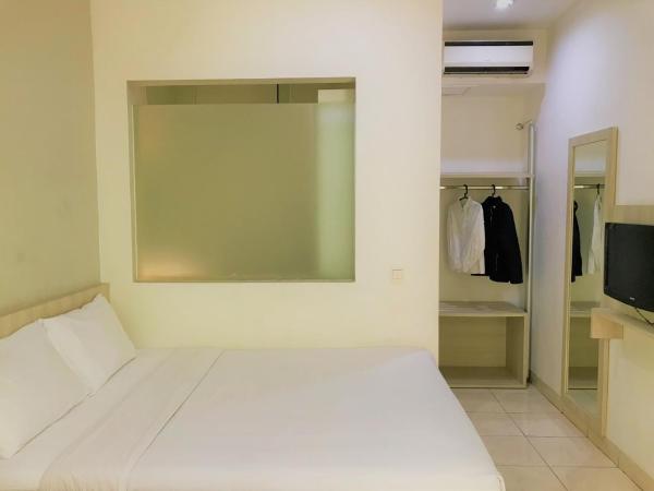 LeGreen Suite Penjernihan : photo 7 de la chambre chambre double ou lits jumeaux standard
