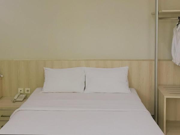 LeGreen Suite Penjernihan : photo 5 de la chambre chambre double ou lits jumeaux supérieure