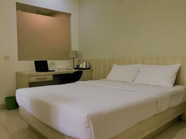 LeGreen Suite Penjernihan : photo 2 de la chambre chambre double ou lits jumeaux supérieure