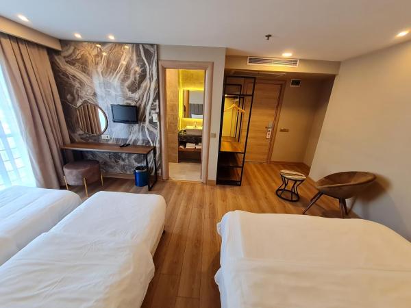 Air Boss Istanbul Airport and Fair Hotel : photo 9 de la chambre chambre triple standard