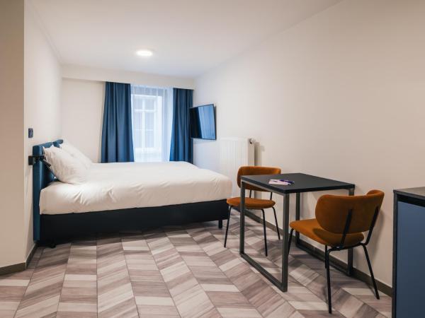 ROXI Residence Gent : photo 10 de la chambre chambre lits jumeaux standard