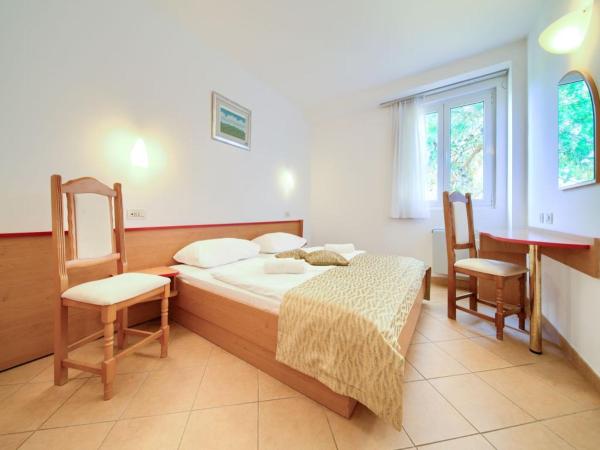 Villa Lovorka - Hotel Resort Dražica : photo 1 de la chambre chambre attribuée à l'arrivée