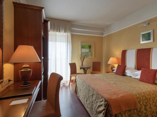 Bio Boutique Hotel XU' - Gruppo Ambienthotels : photo 1 de la chambre chambre triple classique