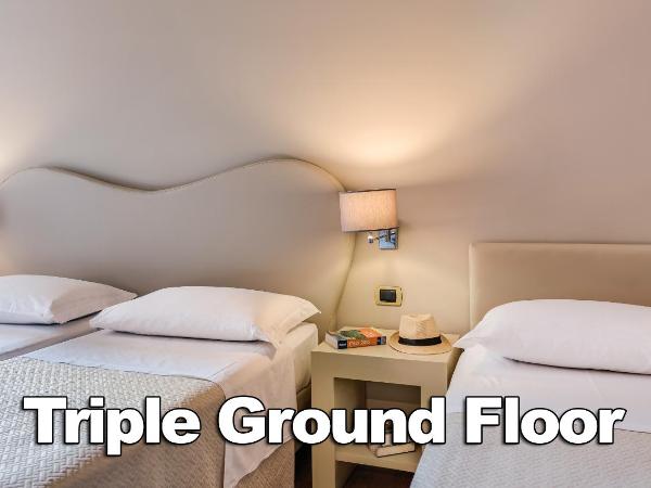 Hotel La Fortezza : photo 1 de la chambre chambre triple - rez-de-chaussée