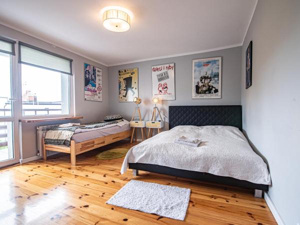 HydroZagadka Kołobrzeg : photo 1 de la chambre chambre lit queen-size avec balcon