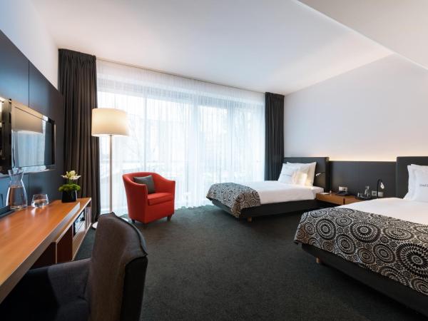 THE MADISON Hotel Hamburg : photo 3 de la chambre studio lit king-size avec kitchenette