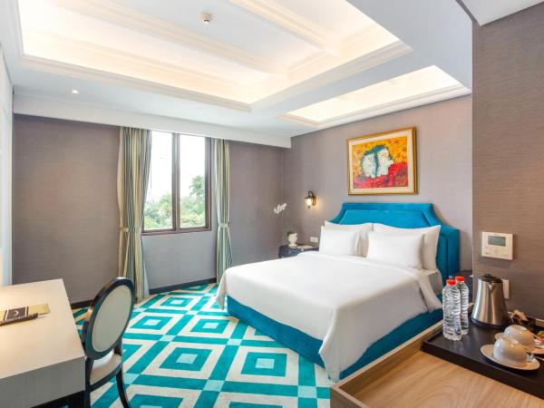 Hotel Des Indes Menteng : photo 4 de la chambre grande chambre double deluxe