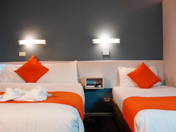 Waterfront Lodge Motel : photo 8 de la chambre chambre double deluxe avec lit d'appoint