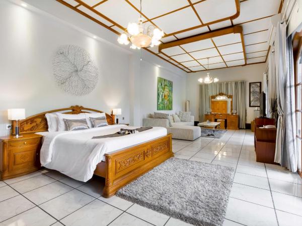 Raintree Boutique Villa & Gallery : photo 1 de la chambre suite junior - vue sur jardin