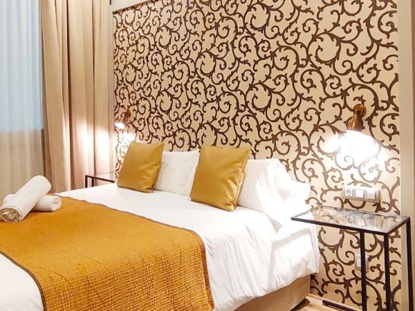 Casa Balmes : photo 1 de la chambre chambre double avec lit d'appoint – vue sur cour