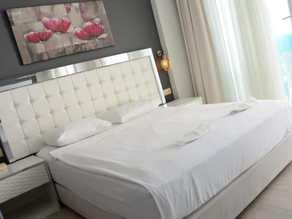 Le Bleu Hotel & Resort Kusadasi : photo 4 de la chambre chambre double ou lits jumeaux avec vue sur les terres