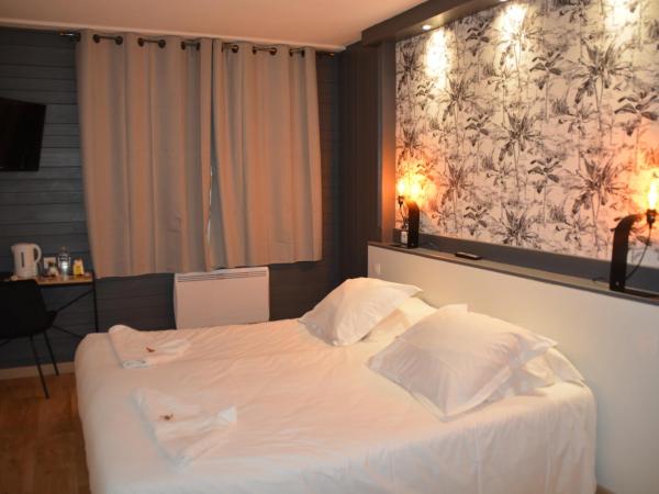 Cit'Hôtel le Welcome : photo 1 de la chambre chambre double deluxe