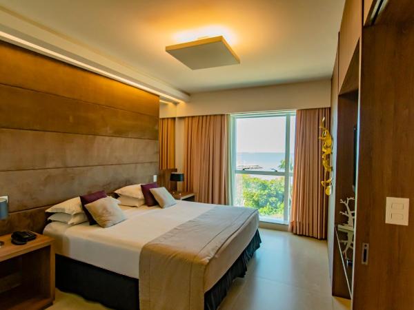 Hotel Beira Mar : photo 1 de la chambre suite avec baignoire spa