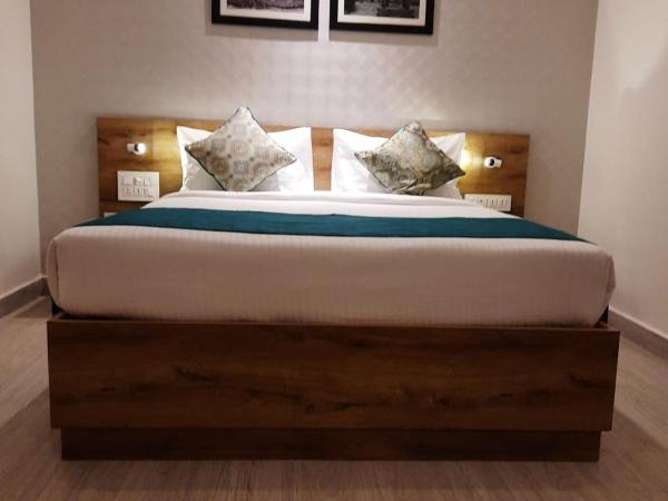 Regenta INN Grand Koramangala by Royal Orchid Hotels : photo 8 de la chambre chambre lit king-size deluxe