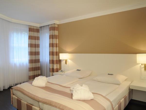 relexa Waldhotel Schatten Stuttgart : photo 5 de la chambre suite junior