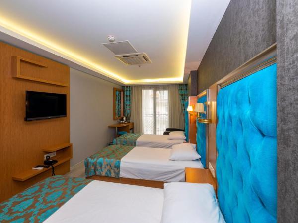 Grand Palace Hotel : photo 2 de la chambre chambre triple deluxe