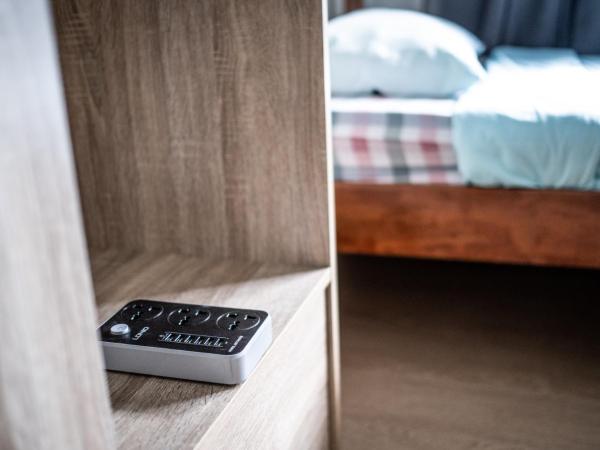 Step-in Lodge : photo 3 de la chambre chambre quadruple avec salle de bains commune