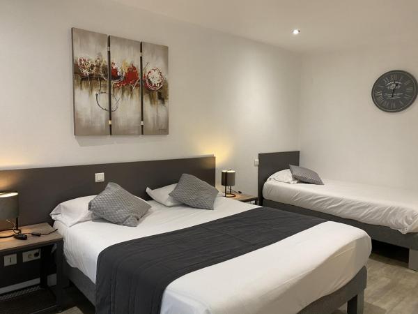 Logis Hôtel L'Oliveraie : photo 1 de la chambre chambre triple