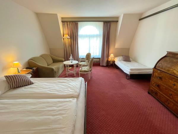 Hotel Monopol Luzern : photo 4 de la chambre chambre triple