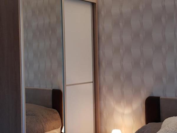 Rózsa Apartmanház : photo 2 de la chambre appartement