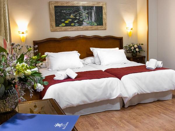 Hotel Reina Cristina : photo 2 de la chambre chambre triple deluxe