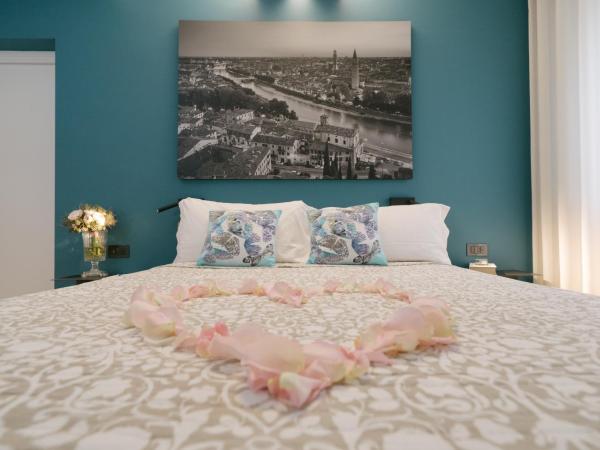 Hotel Giulietta e Romeo ***S : photo 3 de la chambre suite 2 chambres avec terrasse - bâtiment séparé