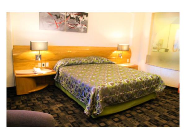 Hotel Mandarin Carton : photo 1 de la chambre suite lit king-size avec baignoire spa