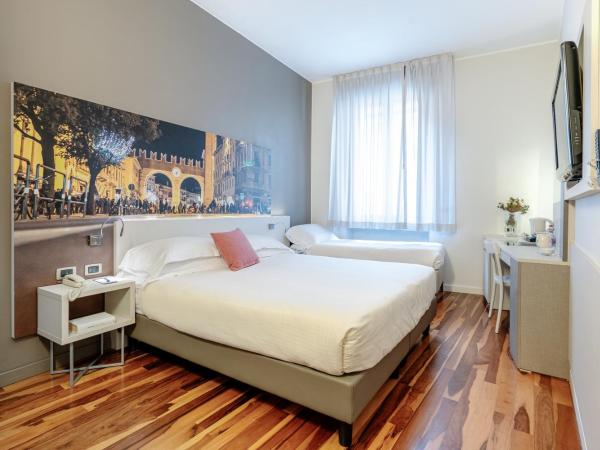 Hotel Giulietta e Romeo ***S : photo 1 de la chambre chambre triple