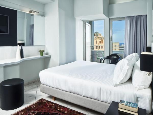 AQUAMARE CITY and BEACH : photo 1 de la chambre suite classique - vue latérale sur mer