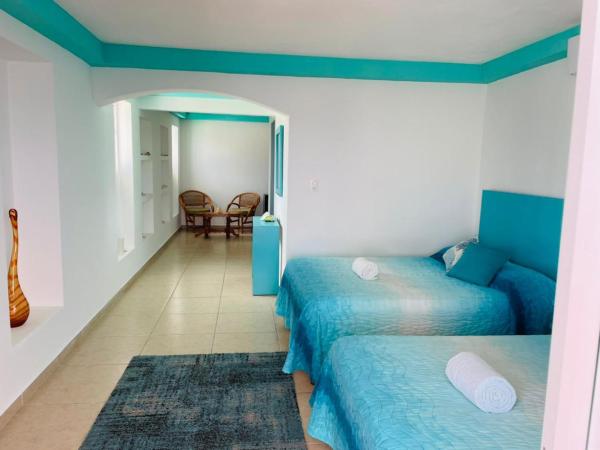 Habitación Amanecer Turquesa #2 : photo 2 de la chambre chambre lits jumeaux deluxe - vue sur mer