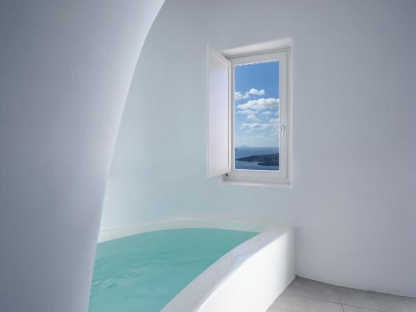 Panorama Boutique Hotel : photo 1 de la chambre suite troglodyte avec bain à remous - vue sur caldeira