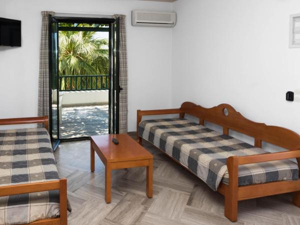 Anna Maria Village : photo 9 de la chambre appartement 1 chambre - vue sur jardin