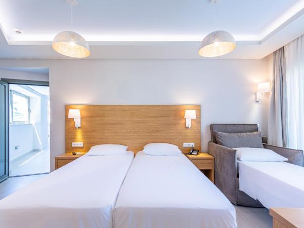 Anna Maria Village : photo 2 de la chambre chambre triple - vue sur jardin