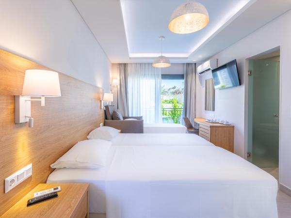 Anna Maria Village : photo 1 de la chambre chambre triple - vue sur jardin