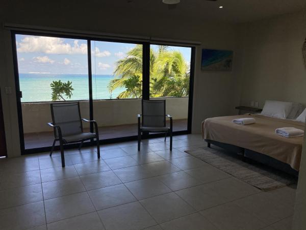 Cuxos Hotel Beachfront : photo 6 de la chambre chambre lit king-size - vue sur mer