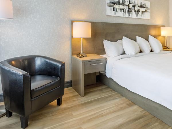 Repotel Henri IV Québec : photo 2 de la chambre chambre lit king-size deluxe