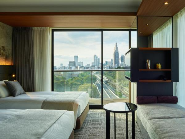 Mitsui Garden Hotel Jingugaien Tokyo Premier : photo 1 de la chambre hébergement d'angle supérieur lits jumeaux avec balcon