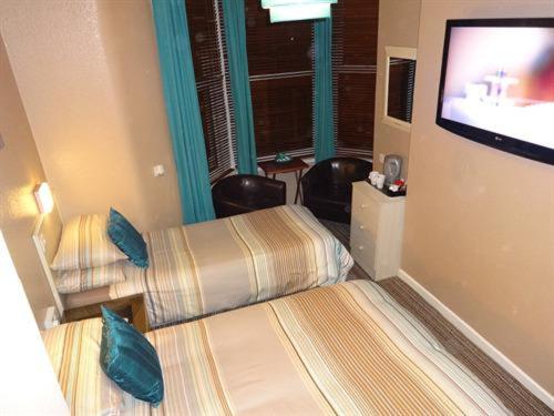 The Craimar : photo 2 de la chambre chambre triple