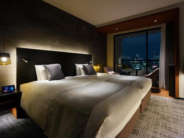 Mitsui Garden Hotel Jingugaien Tokyo Premier : photo 2 de la chambre hébergement lits jumeaux moyen avec balcon