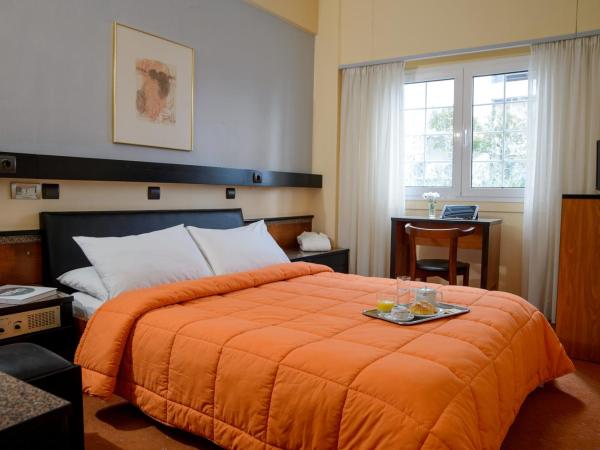 Victory Inn : photo 1 de la chambre petite chambre double