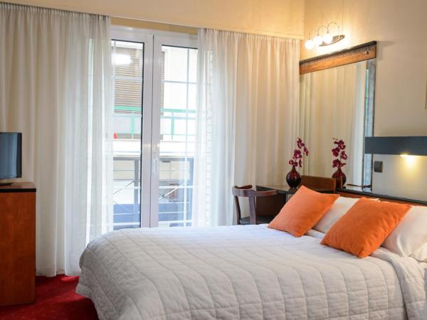 Victory Inn : photo 2 de la chambre chambre double avec petit balcon