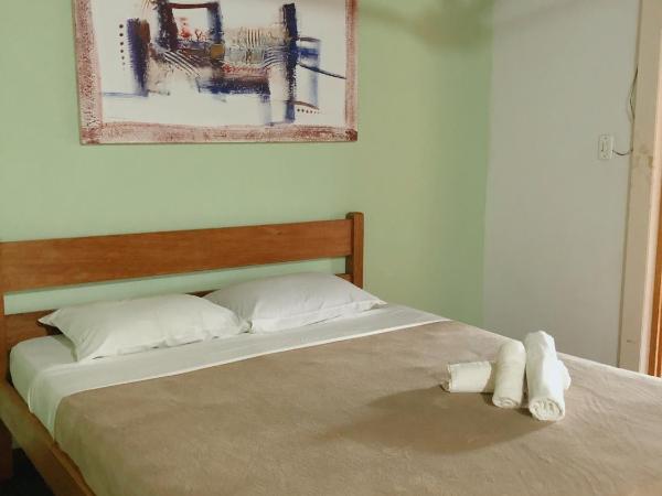 Anexo Aldeia Búzios : photo 2 de la chambre chambre triple