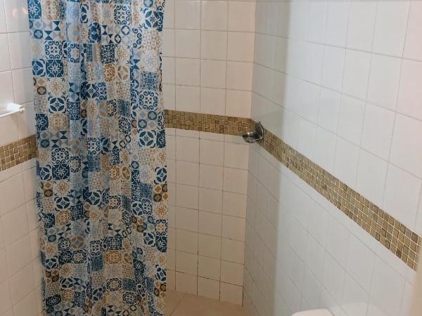 Anexo Aldeia Búzios : photo 4 de la chambre chambre triple