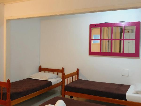 Anexo Aldeia Búzios : photo 1 de la chambre chambre quadruple