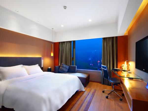 Grand Mercure Dongguan Humen : photo 5 de la chambre chambre lit king-size supérieure